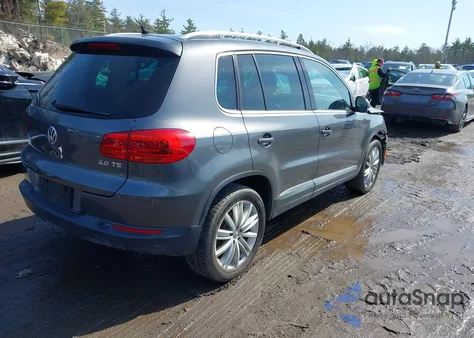 2014 Volkswagen Tiguan Sel from USA, damaged, VIN WVGAV3AXXEW605162